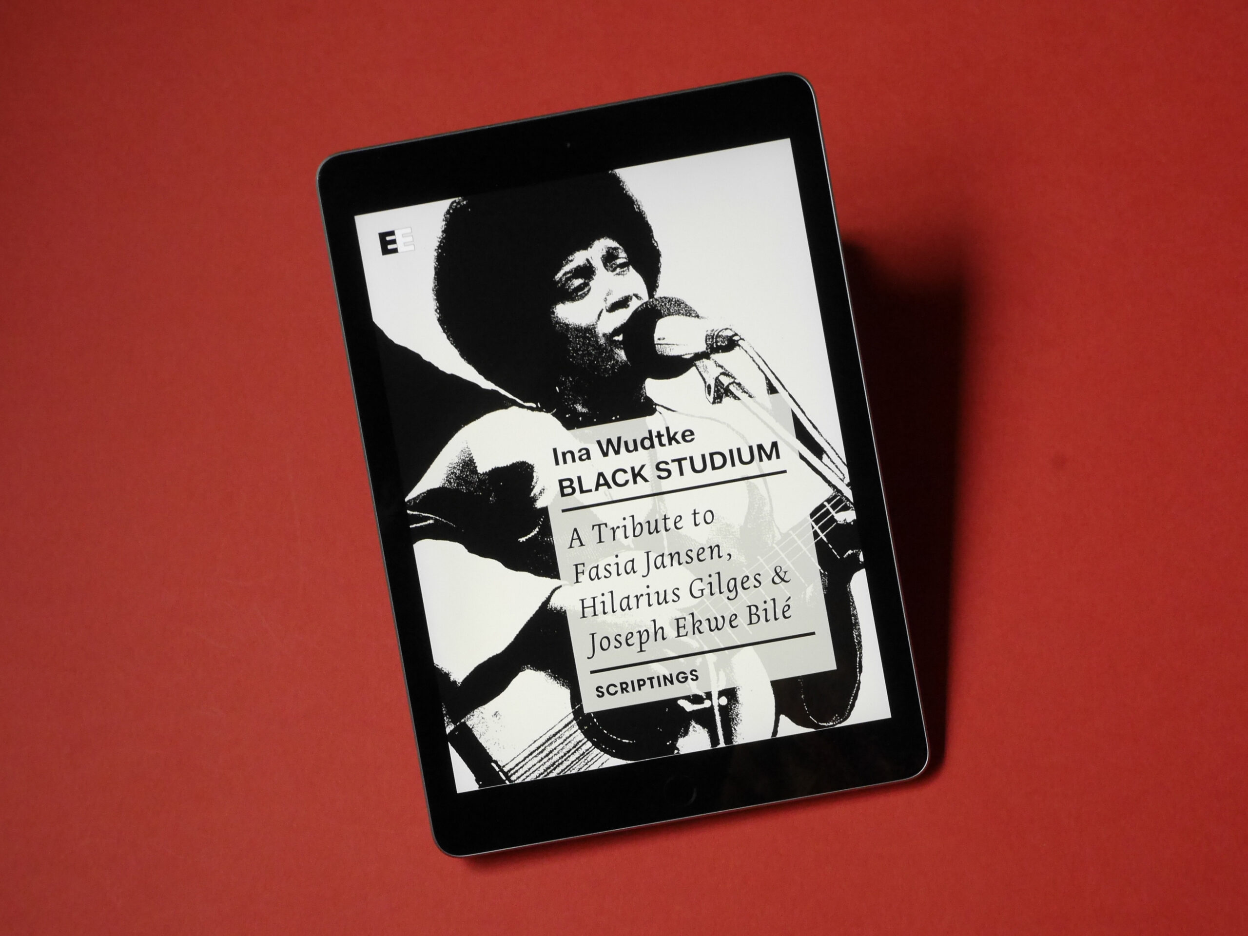 _1320498 Cover image of the publication Black Studium on a ipad. On the picture is a Black woman with a microfone